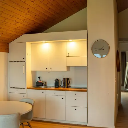 Surfers Near Interlaken, At With Pool